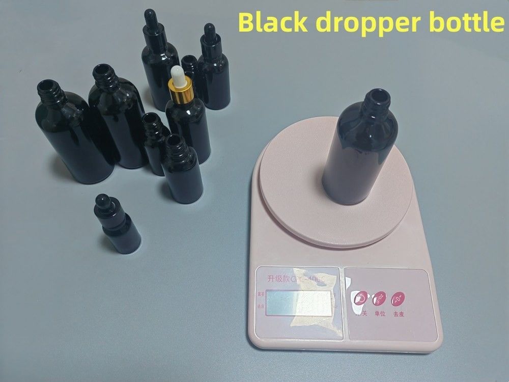 5ml 10ml 15ml 20ml आवश्यक तेल सीरम सपाट कंधे गोल चमकदार आवश्यक तेल की बोतल काला ग्लास ड्रॉपर बोतल