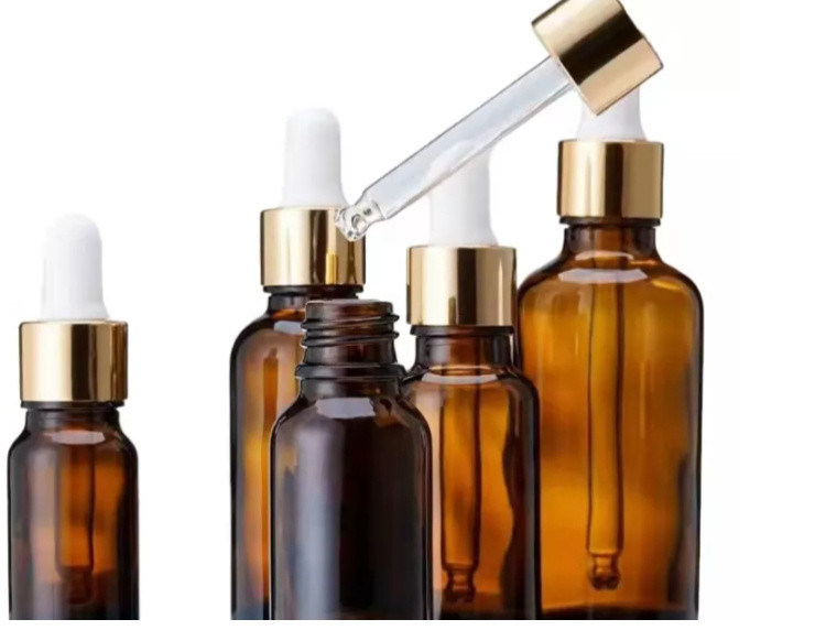 आवश्यक तेल पैकेजिंग 1OZ 2OZ 20ml 30ml 50ml एम्बर आवश्यक तेल सीरम बाल प्रतिरोधी टोपी के साथ ग्लास ड्रॉपर बोतल