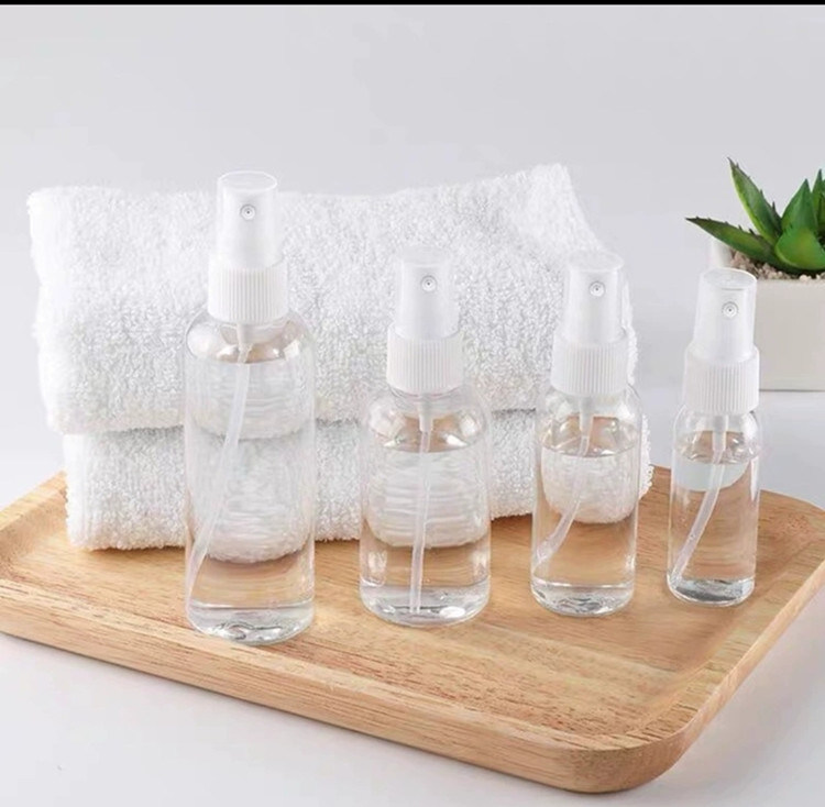 50 मिलीलीटर 60 मिलीलीटर 100 मिलीलीटर पीईटी पारदर्शी गोल अनुकूलन पुनः भरने योग्य हाथ सैनिटाइजर गोल पुनः भरने कॉस्मेटिक पीईटी प्लास्टिक स्प्रे बोतल