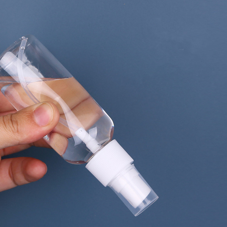 50ml पोर्टेबल यात्रा मिनी जेब स्पष्ट पारदर्शी लोशन शराब कीटाणुनाशक फ्लैट गोल पीईटी प्लास्टिक स्प्रे बोतल